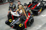 f1-australian-gp-2002-sarah-jane-posing-with-alex-yoong-mark-webber-and-paul-stoddart.jpg