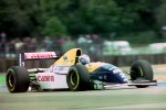 Alain_Prost_-_Williams_FW15C_during_practice_for_the_1993_British_Grand_Prix_(33557468541).jpg