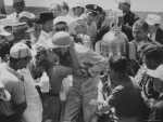 stan-wayman-winner-jim-rathmann-of-the-indy-500-kissing-his-wife.jpg