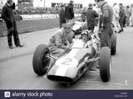 1964-goodwood-colin-chapman-peter-arundell-lotus-25-grid-H8TBDF.jpg