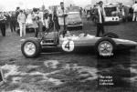 Clark, Lotus 25 with film camera, Oulton Park Gold Cup 1963..jpg