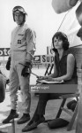 1965 English racing driver John Surtees in the pits at Silverstone.jpg