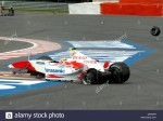 dpa-australian-formula-one-pilot-ryan-briscoe-toyota-skids-off-the-D3GGP9.jpg